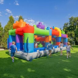 HeroKiddo Block Party 20 ft Commercial Grade Kids Inflatable Obstacle Course with Climbing Wall, Tunnels, Slide, Includes Air Blower